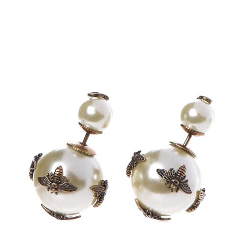 dior tribal bee earrings.